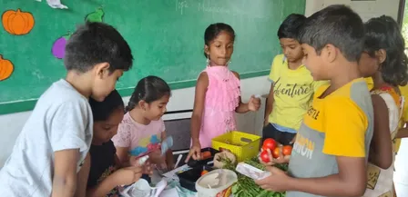 Third-grade students at Vidhya Peetham i-School, Salem, enthusiastically running a vegetable shop, applying multiplication in a real-life scenario, part of a unique math activity.
