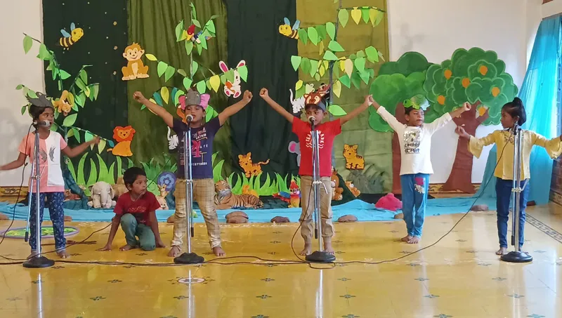 Second-grade students at Vidhya Peetham i-School dressed as characters from Jataka Tales, showcasing their skit on stage, embodying the spirit of the best CBSE school in Salem.