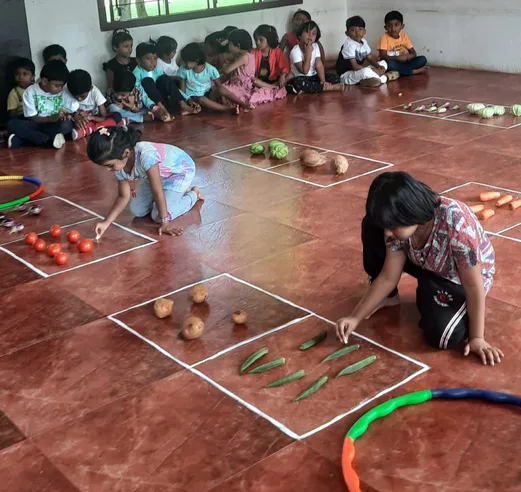 Ukg Bigger group activity 1_result UKG kids in Salem's top CBSE school actively participating in kindergarten math activities.
