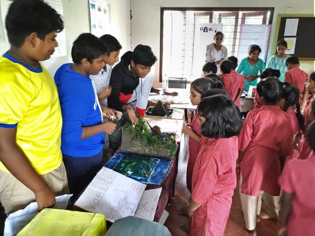 Vibrant student-led exhibit showcasing models of water management and fossils at a renowned Salem CBSE school's expo.