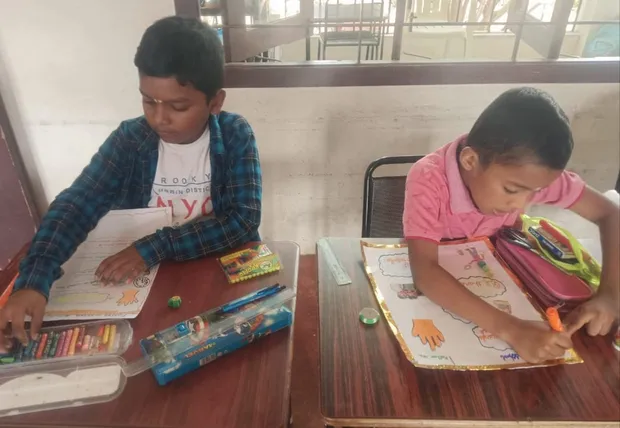 Second-grade students of Vidhya Peetham i-School, the best school in Salem, diligently sketching and coloring for their poster making session.