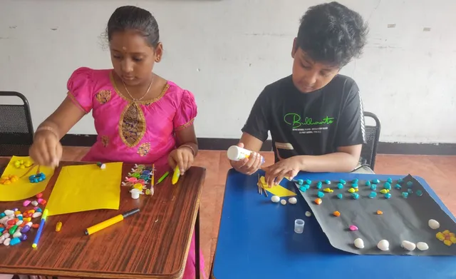 Grade - 4 Pebble Art 3_result Concentrated young artists at a top school in Salem designing pebble art with careful attention to detail. ???️