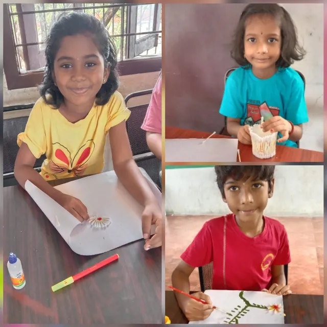 Group of students showcasing their cotton bud art pieces during an outdoor activity at a Salem school.