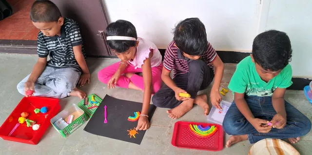 Young learners at Vidhya Peetham i-School shaping clay into various artistic forms.