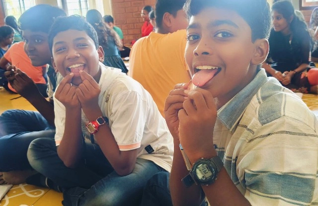 Students tasting electricity from a 9 volt battery!