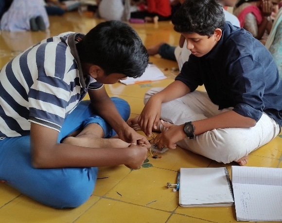 Students collaborating on a circuit