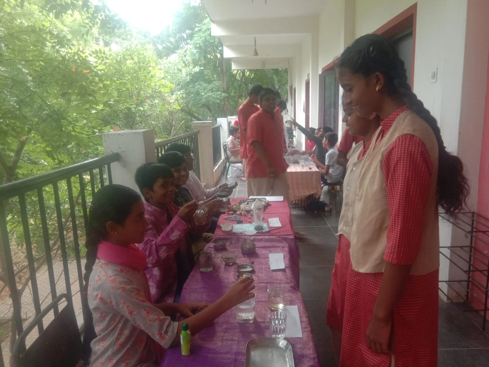 Students at best CBSE school in Salem participating in hands-on science experiment about sorting materials