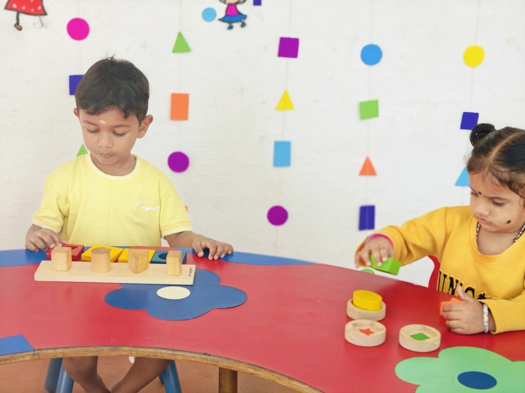 Early learners mastering shape recognition through hands-on activities