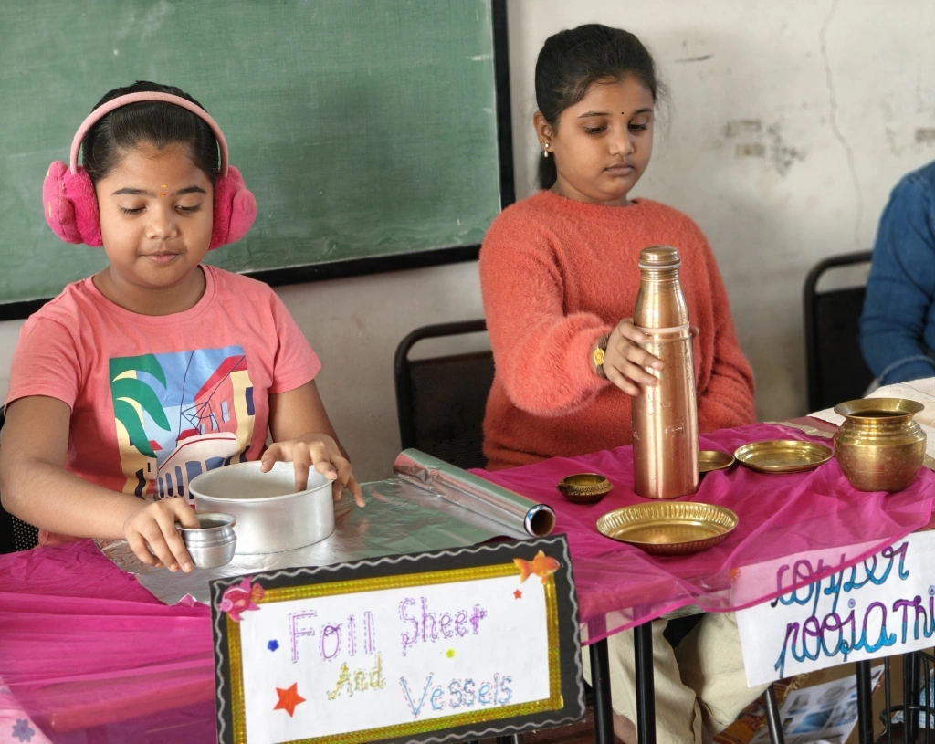 Students presenting tea and spices in their cash crops display