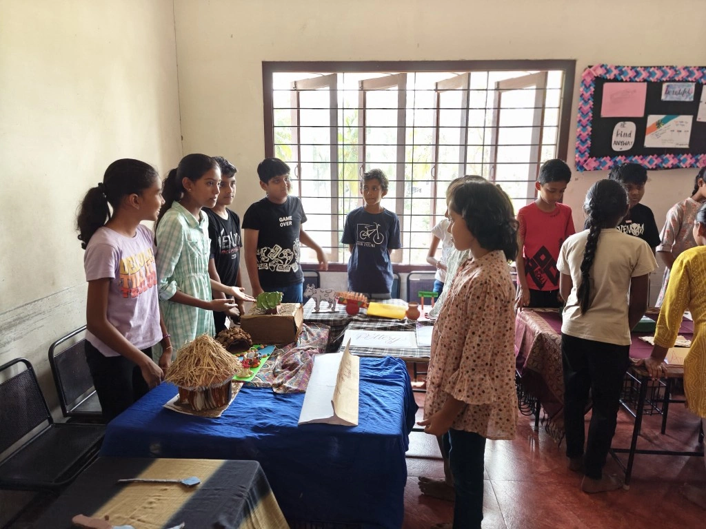 Students participating in interactive museum exhibit presentations