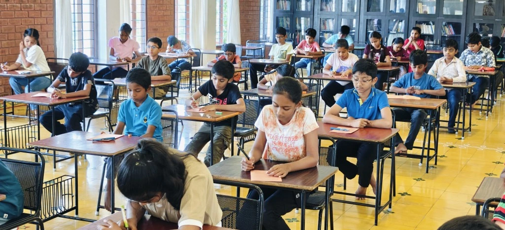 Students concentrating on spelling bee worksheets at top schools in Salem