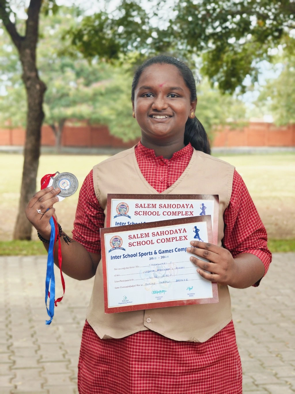 sports this week - shotput champ